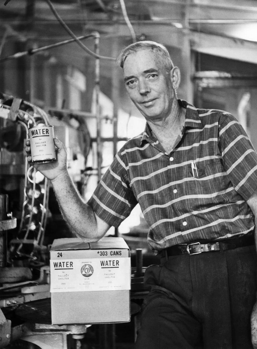 W. Irving Beauchamp displayed his new product: canned water, 1961.