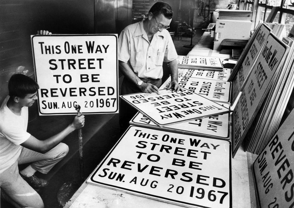 Richmond city employees prepared signs that would alert motorists to a new traffic pattern, 1967.