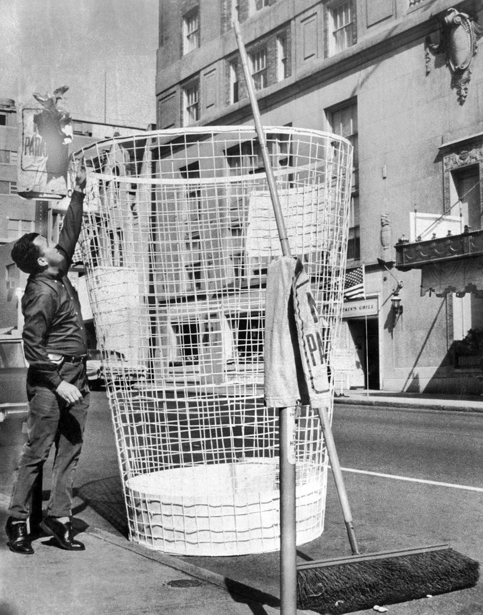 A huge trash bin was displayed on Fifth Street in downtown Richmond to dramatize an ongoing anti-litter campaign, 1965.