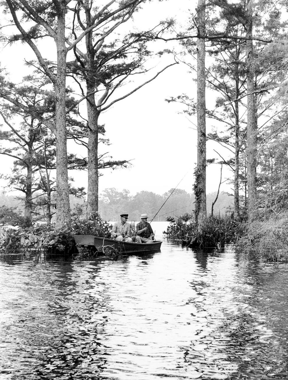 Two men fished for bluegills in Chickahominy Lake, a large water supply reservoir along the New Kent-Charles City county line, 1961.