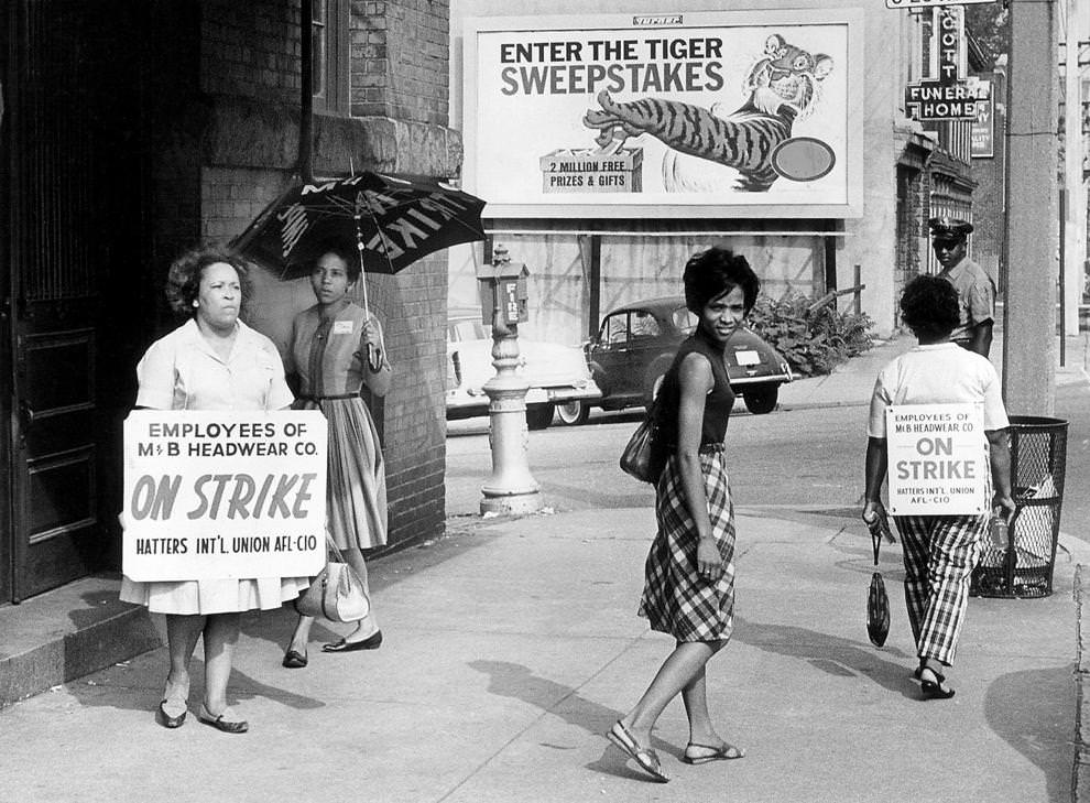 Employees of M&B Headwear Co. Inc. picketed outside the Richmond factory, one of the country’s largest suppliers of military caps, 1965.
