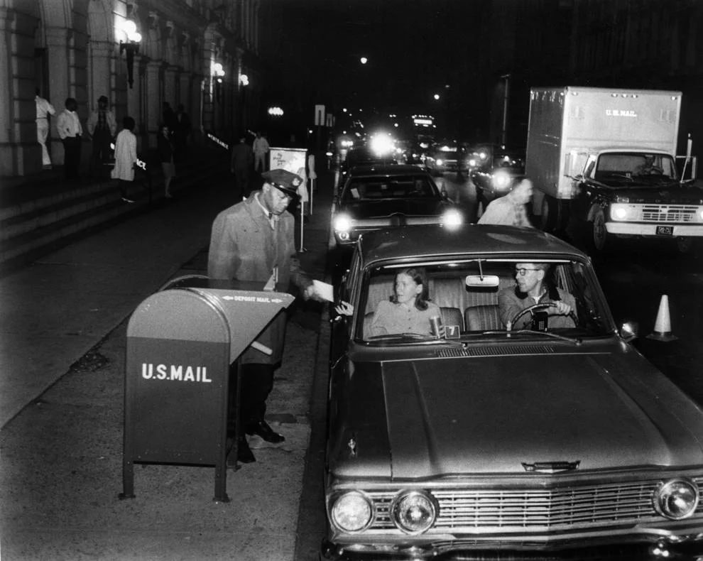 A couple delivered their tax return to the post office at 10th and Main streets in downtown Richmond, 1968.