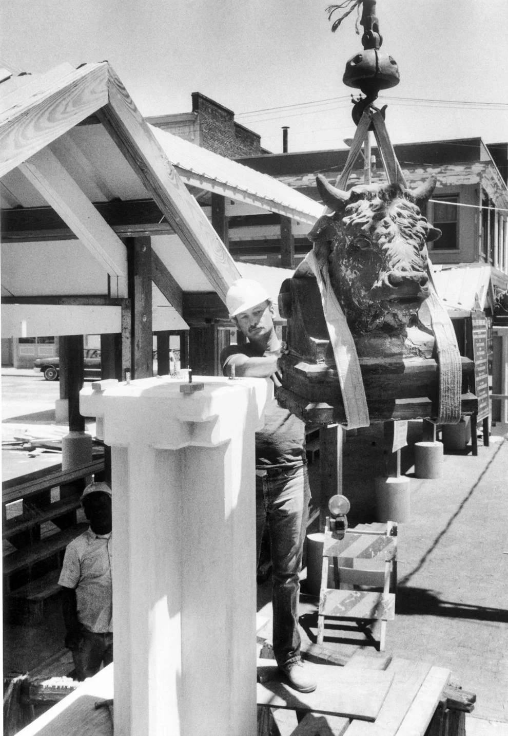 One of two surviving antique terra cotta bull’s heads was prepared for mounting by Ron Kingery at the 17th Street Farmers’ Market in Richmond, 1966.