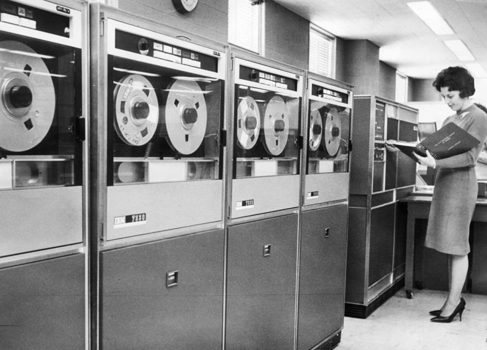 Lois Willis of Chesapeake and Potomac Telephone Co. in Richmond reviewed data in a computer room, 1965.