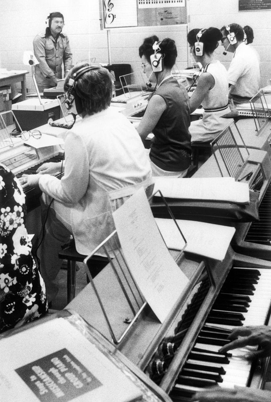 Larry Rast directed a group piano class at the University of Richmond, 1975.