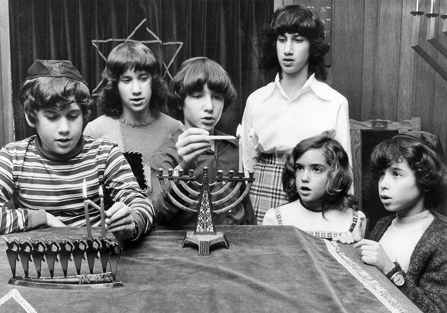 Young members of Temple B’nai Shalom lighted candles on the menorah in celebration of Hanukkah, 1974.