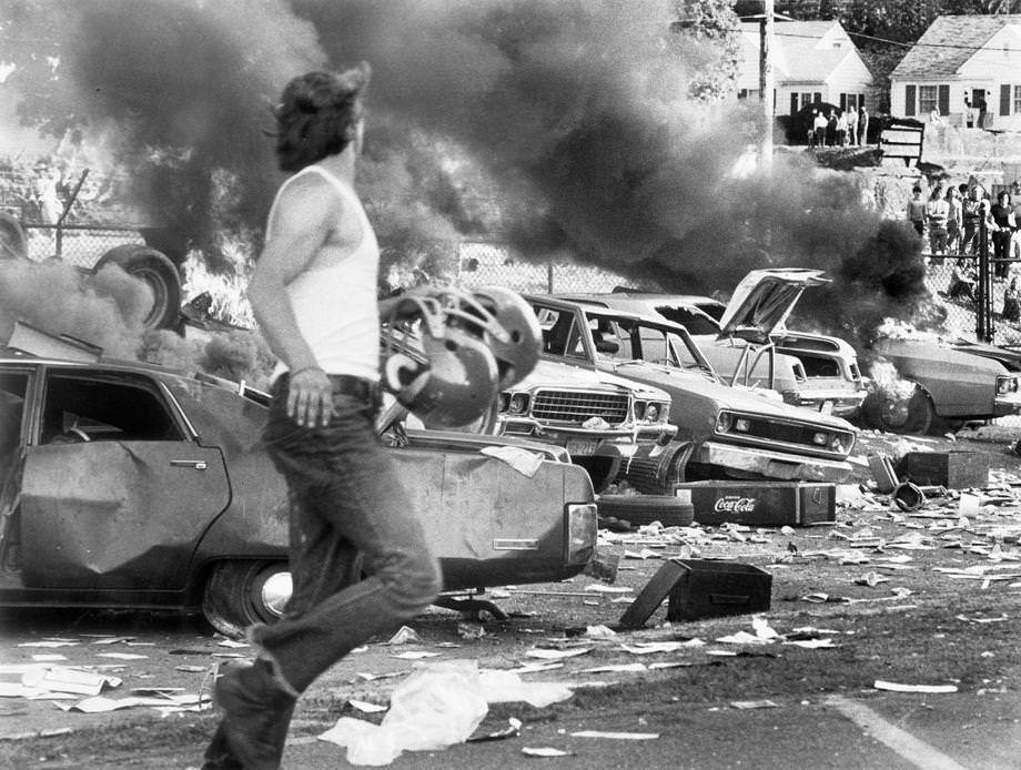 Burning cars and debris marked a riot that broke out during the Cherry Blossom Music Festival at City Stadium in Richmond, 1974.