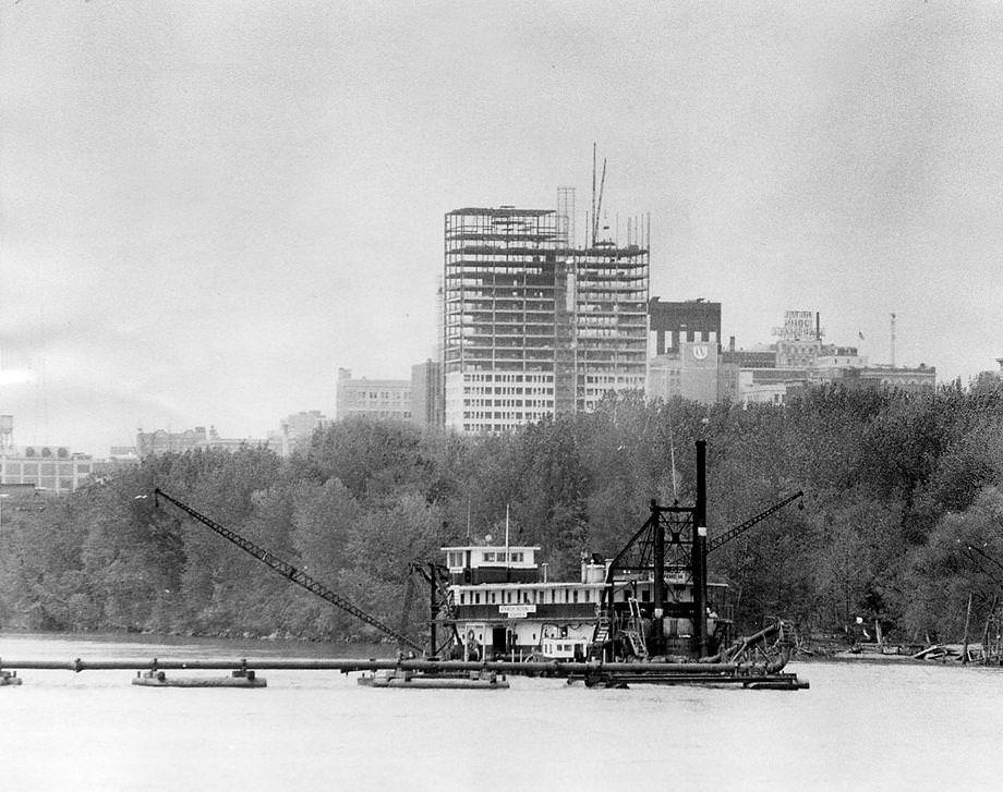 The annual dredging of the James River channel in Richmond was under way, 1973.