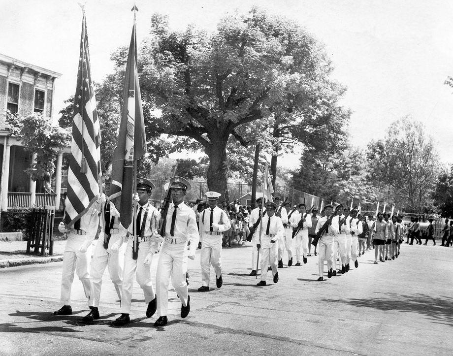 The John F. Kennedy High School rifle team marching on East Grace Street in Richmond, 1970.