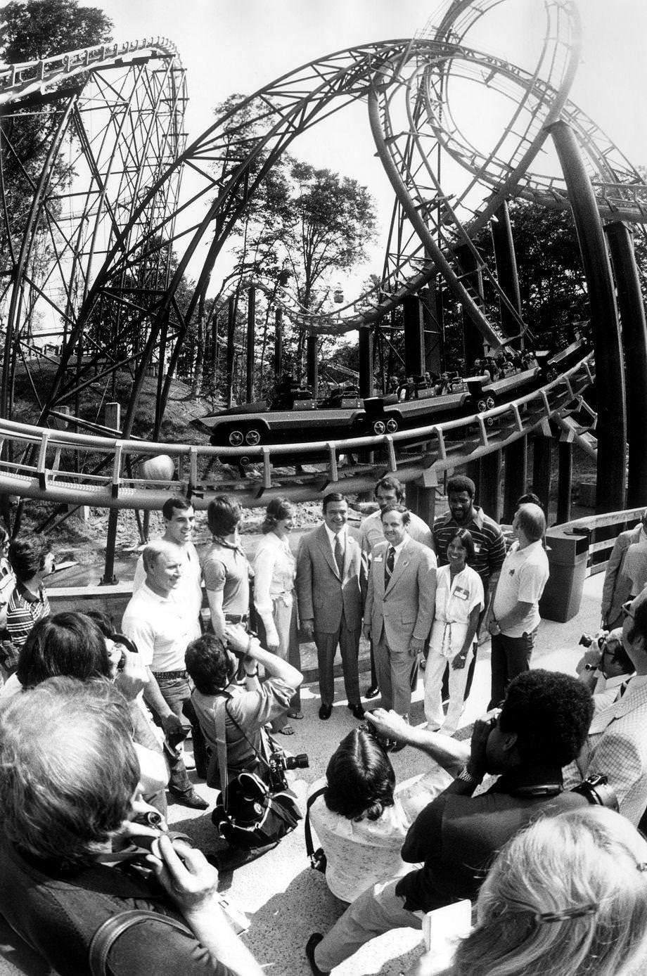 Crowds gathered at the Busch Gardens amusement park near Williamsburg for the grand opening of the Loch Ness Monster roller coaster, which featured quick acceleration, a 13-story drop and a pair of interlocking loops, 1978.