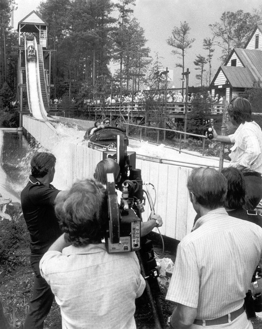 A camera crew set up by the log flume at Kings Dominion in Doswell as filming continued on “Rollercoaster”, 1976.