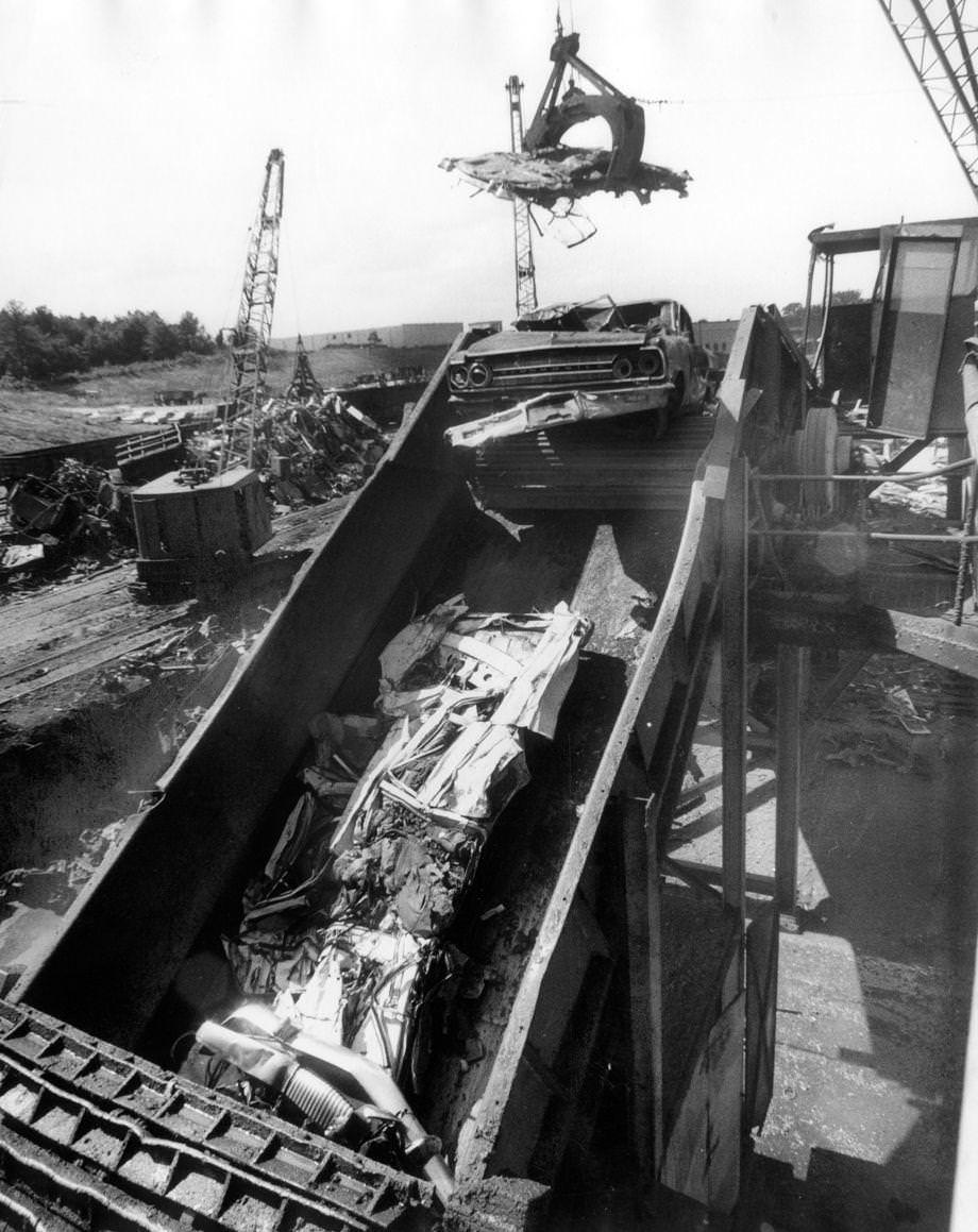 An automobile (minus its tires and gas tank) was fed into a fragmentizer, which could crush the vehicle in less than a minute using an array of hammers weighing nearly 400 pounds each, 1976.