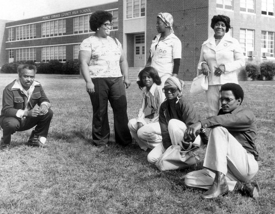 Seven former Prince Edward County residents reunited on the lawn of the former R.R. Moton High School (later Prince Edward County High School), from which they were bared in the 1960s during the state’s Massive Resistance to integration, 1976.