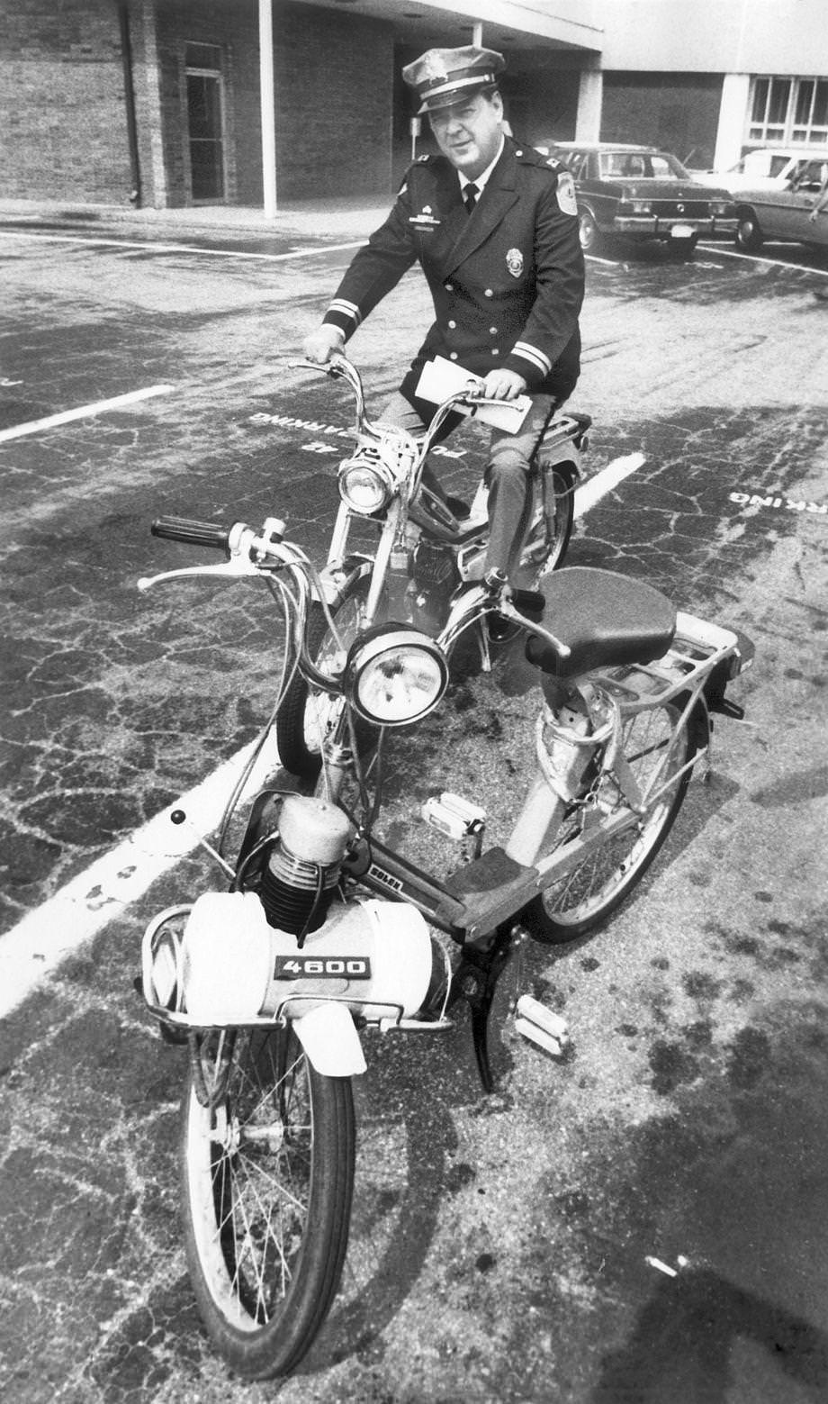 Richmond police Capt. Joseph H. Parker sat on a motorized bike and explained new regulations, 1975.