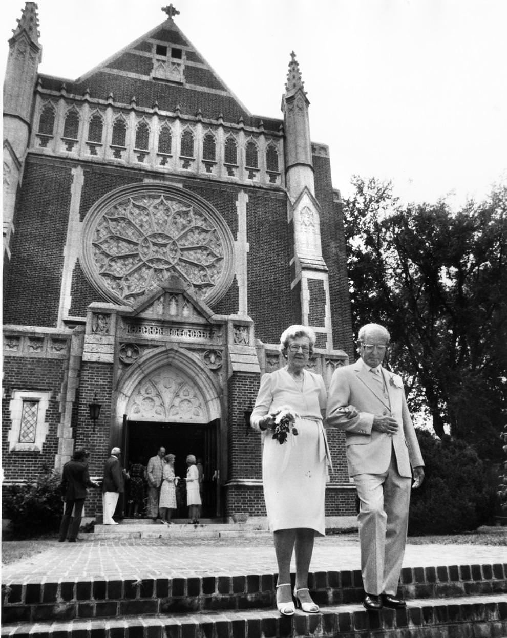 Mr. and Mrs. Elmer Armstrong left the Cannon Memorial Chapel at the University of Richmond after marking a special day, 1981