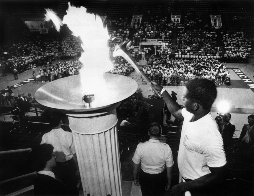 Edward Harris lighted the Virginia Special Olympics torch at the University of Richmond, which drew thousands of disabled athletes, coaches and volunteers, 1985