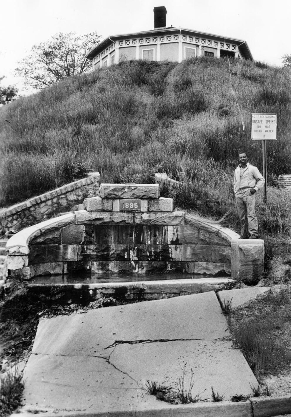 Larry Ingram, president of Neighbors of Chimborazo Park, stood at a contaminated spring along slowly shifting land on Chimborazo Hill in Richmond’s East End, 1987