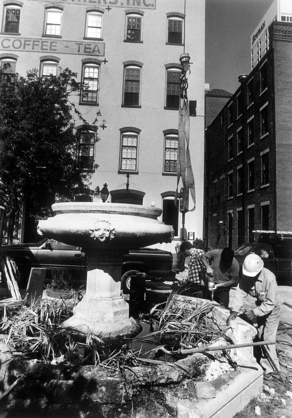 Workers dismantled the Morgan Fountain in Richmond’s Shockoe Slip in preparation for its rebuilding, 1989