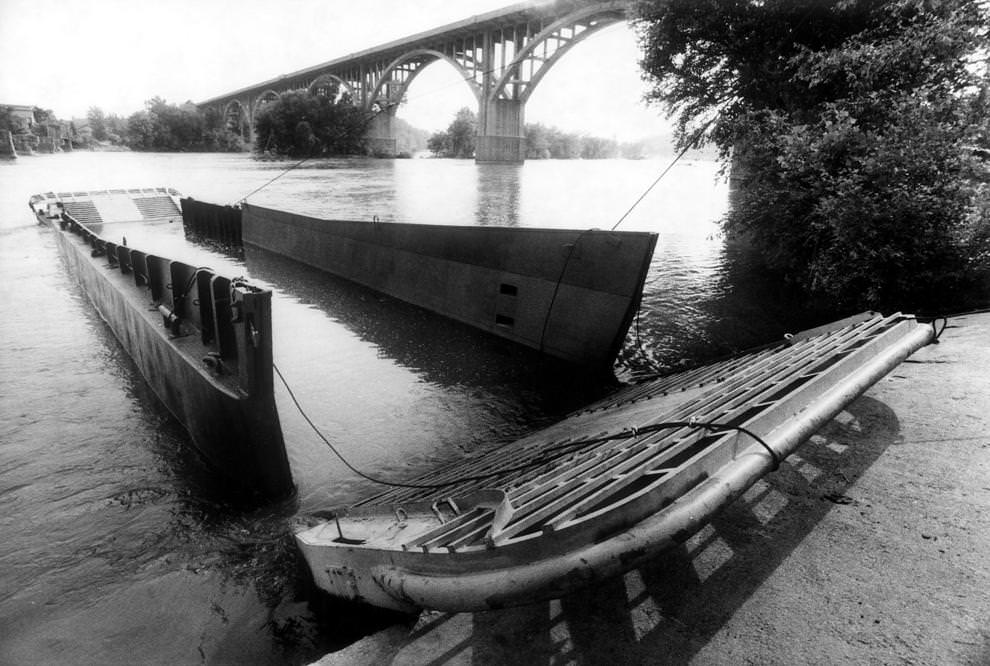 A refurbished Navy landing craft, which sunk earlier that month, was afloat again in the James River in Richmond, 1981