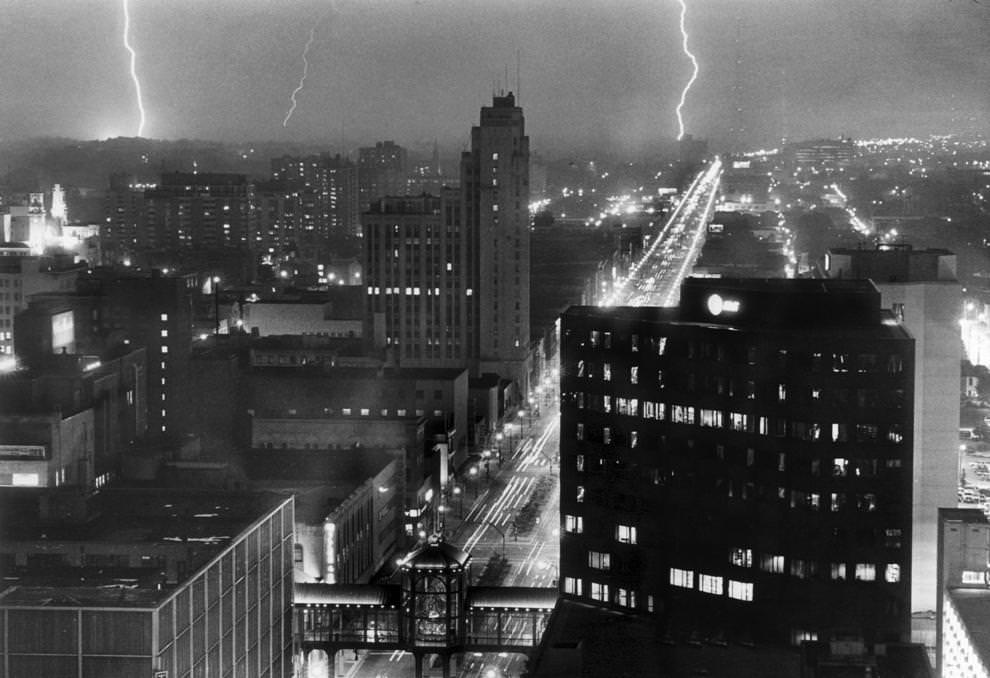 An illuminated Broad Street in Richmond from the City Hall observation deck during a series of torrential rains around Labor Day, 1987
