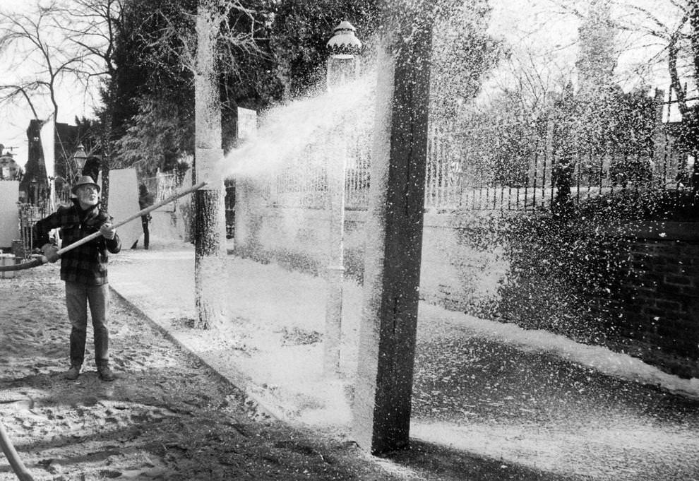 Special effects engineer Dick Johnson sprayed fake snow around St. John’s Episcopal Church on Church Hill in Richmond, 1985