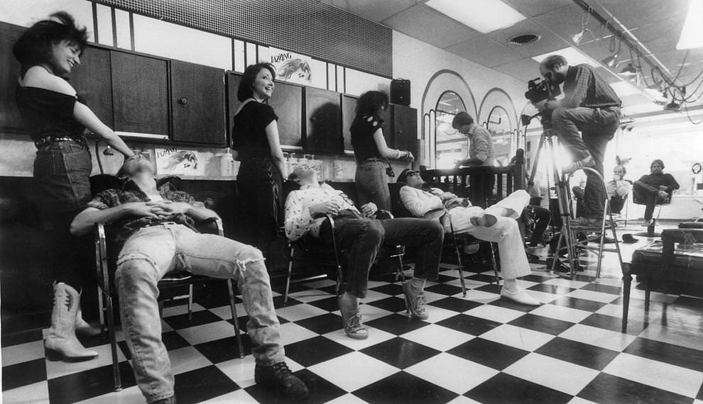 Members of the Richmond band Suzy Saxon and the Anglos had their hair shampooed at a local beauty parlor for a scene in the video for their single “Boys in Dresses.”, 1984