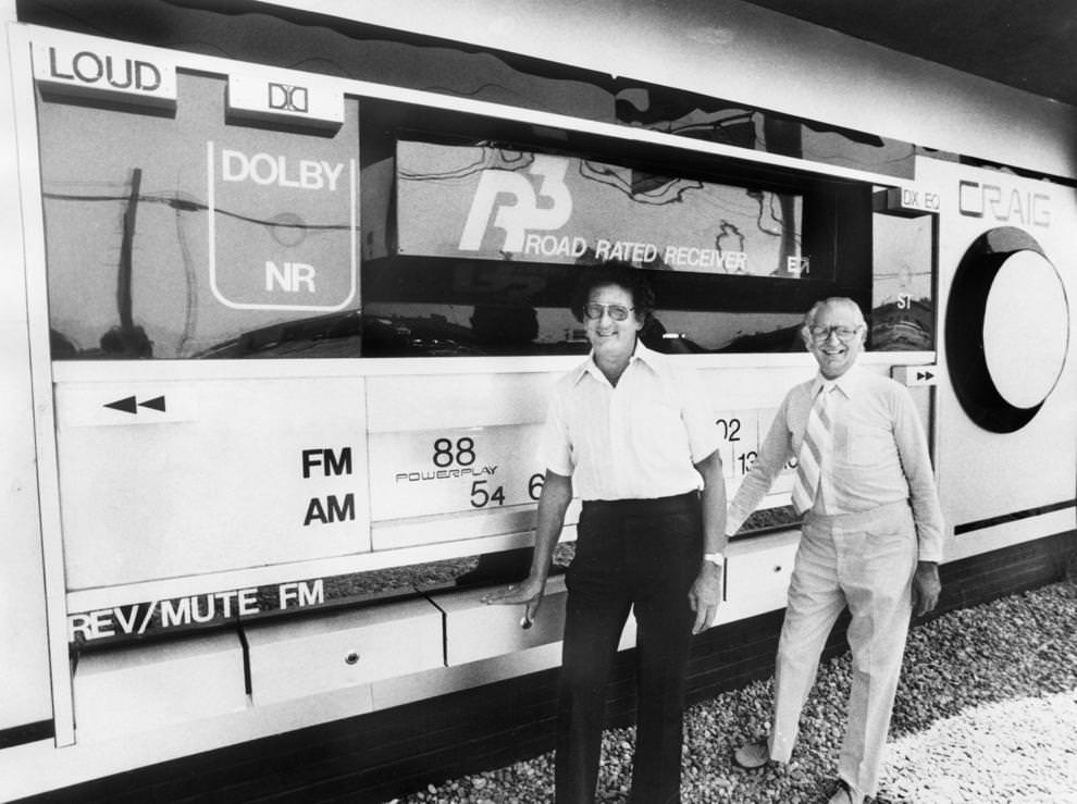 Gene Ladin (left) and Alfred I. Mollen stood in front of a giant working radio they designed, 1980.