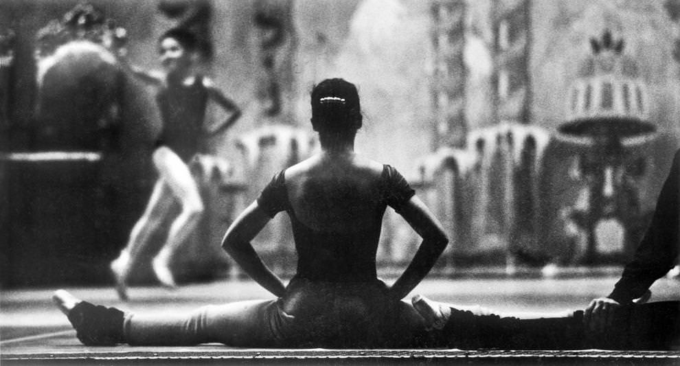 A Richmond Ballet dancer stretched before rehearsal of “The Nutcracker”, 1990