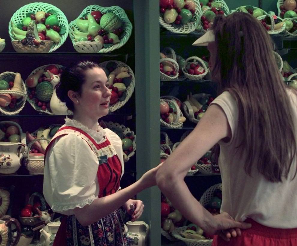 Zuzana Jalcova, of Slovakia, talks to a customer at Busch Garden's Bella Casa Gift Shop Thursday, June 18, 1998.