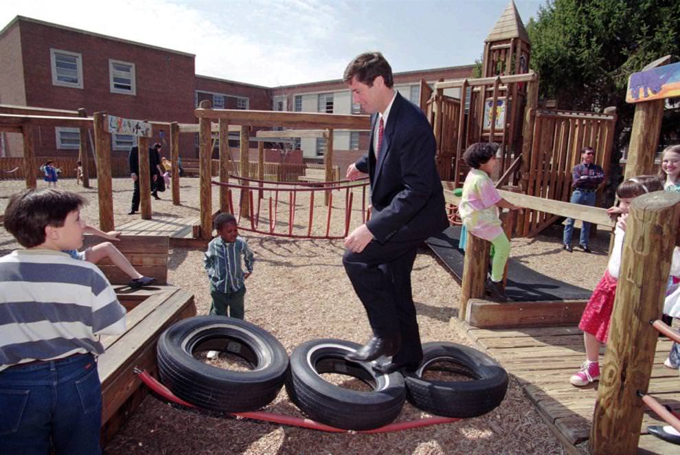 Governor George F. Allen tried out some of the playground equipment Monday, March 27,1995, at Richmond's Mary Munford School