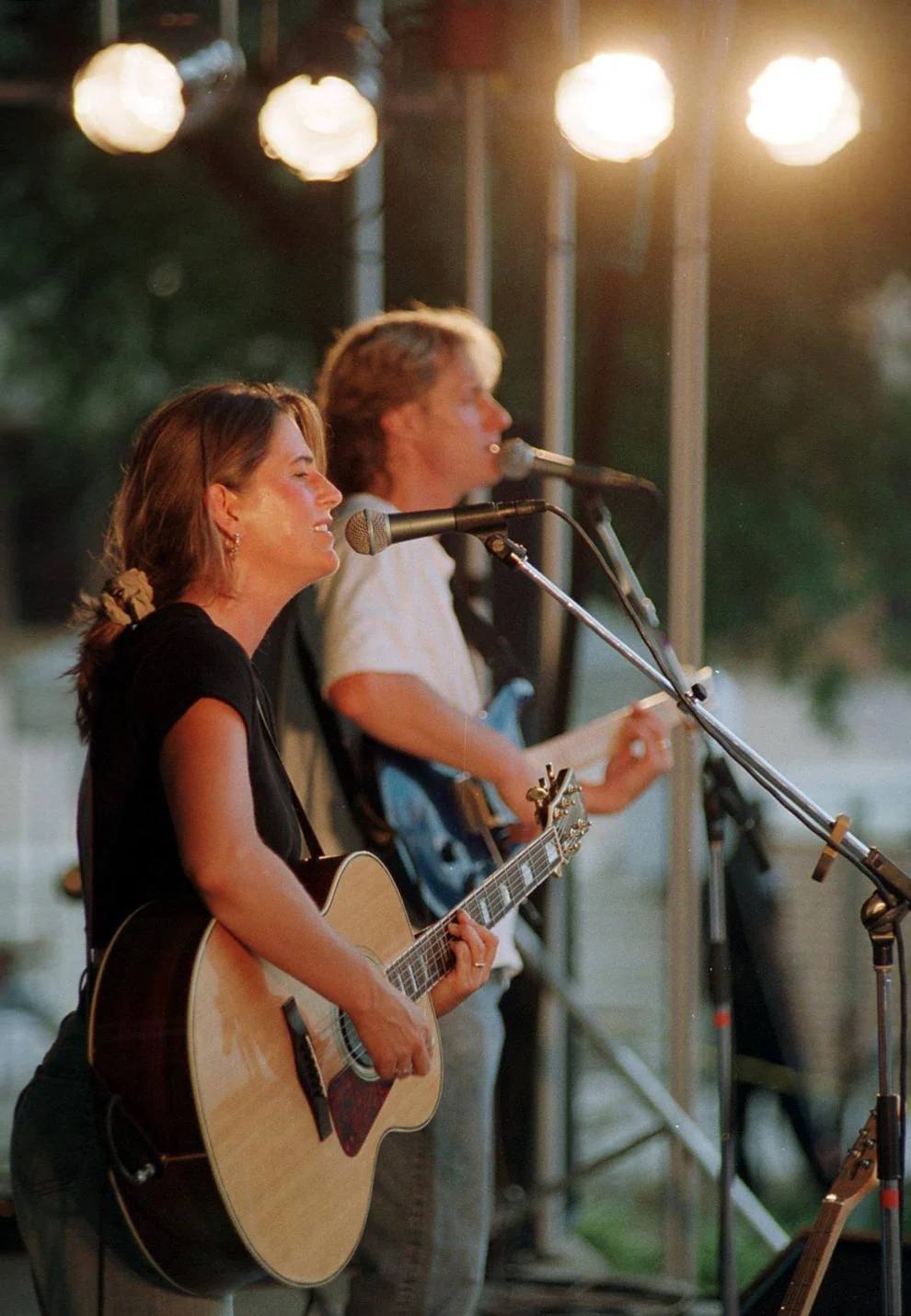 Jennifer Smith and her husband, Scott, members of the band Naked Blue, perform at Festival Park on Friday Cheers, 1999