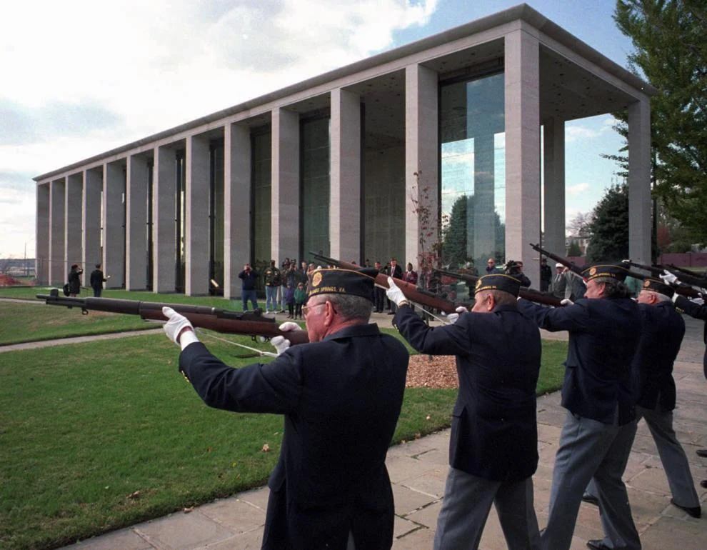 Members of the Honor Guard from American Legion Highland, Highland Springs Post 144 fire a 21 gun salute just before 'Taps' is played after the Veterans Day ceremony at the Virginia War Memorial Monday, 1996