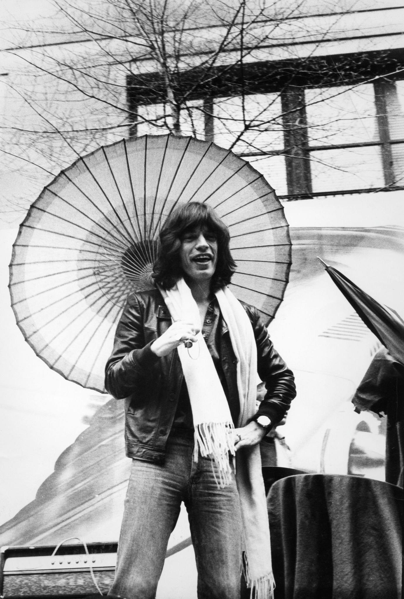 Mick Jagger announces the 'Tour of the Americas '75' on a flatbed truck on 5th Avenue, New York, May 1975.