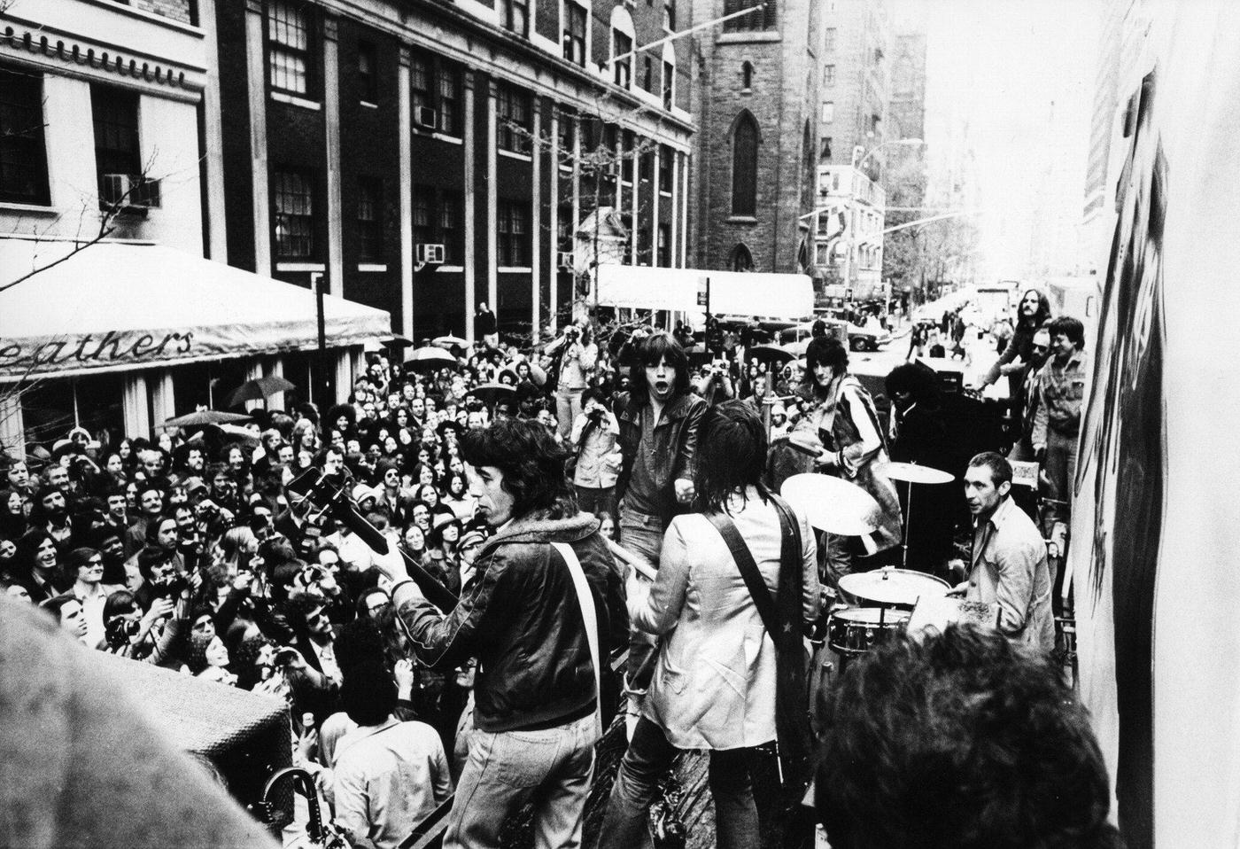 The Rolling Stones announce the 'Tour of the Americas '75' on a flatbed truck on 5th Avenue, New York, May 1975.