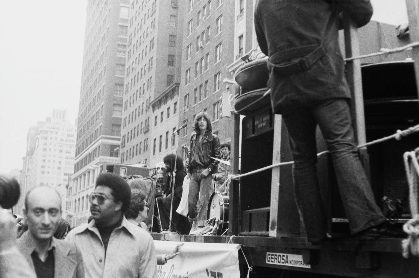 Mick Jagger and Billy Preston perform on a flatbed truck on Fifth Avenue, New York City, 1975.