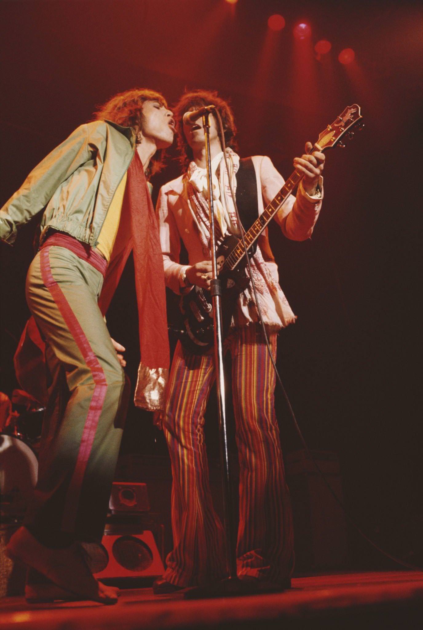 Mick Jagger and Keith Richards perform on stage during the tour, June 1975.