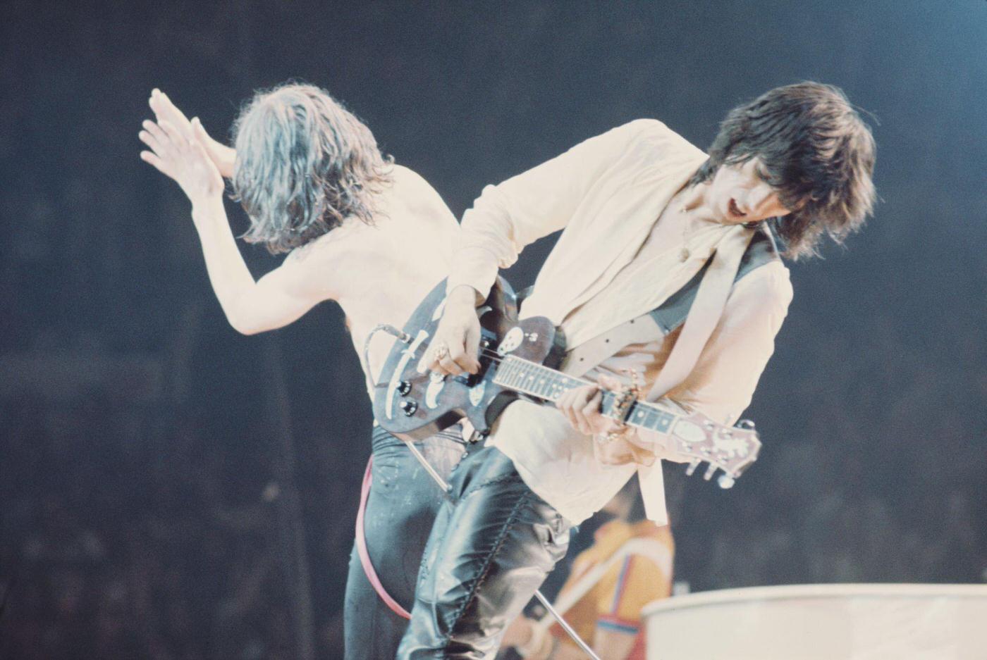 Mick Jagger and Keith Richards perform on stage during the tour, June 1975.