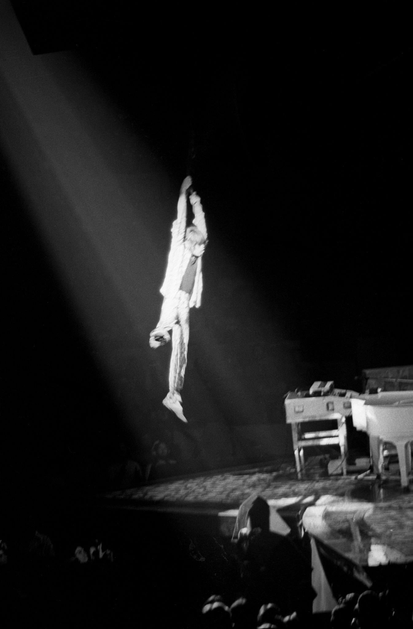 Mick Jagger swings over the crowd at Madison Square Garden during the band's "Tour of America '75" on June 25, 1975, in New York, New York.