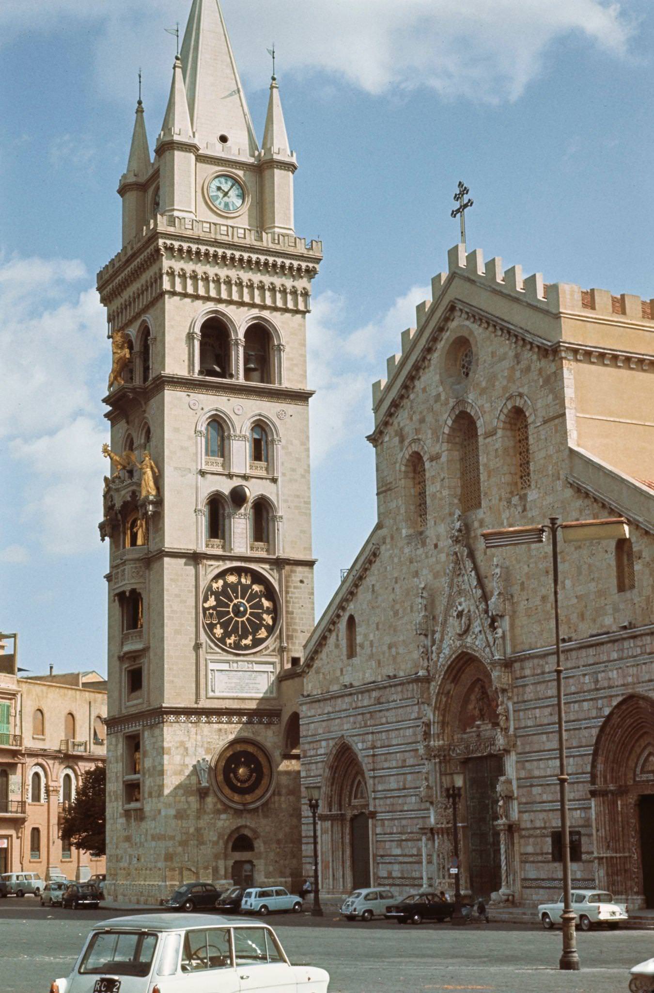 Messina Cathedral and parked cars on Piazza del Duomo in Messina, Sicily, circa 1970.
