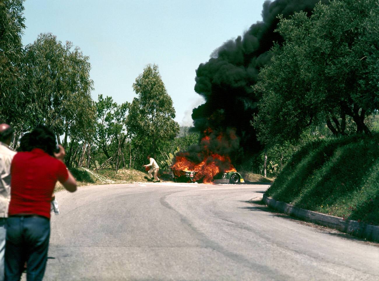 Burning car crash involving Abele Tanghetti's Chevron B21 in the Targa Florio race in Sicily, 1973.