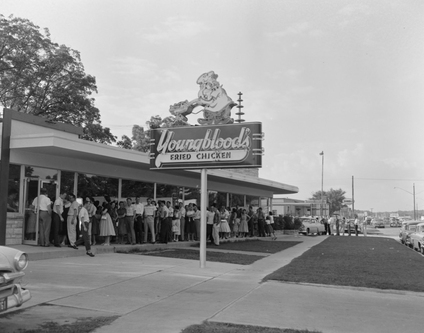 Customers Outside Youngblood's Fried Chicken on South Lamar Street, Austin, 1958.