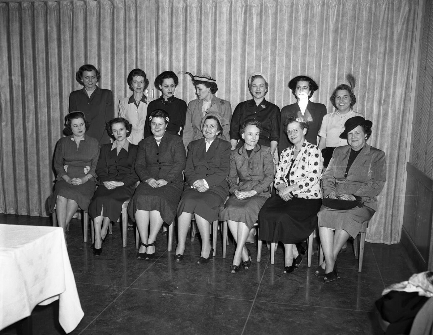 Desk and Derrick Club of Austin Posing in Front of Accordion Wall, 1952.