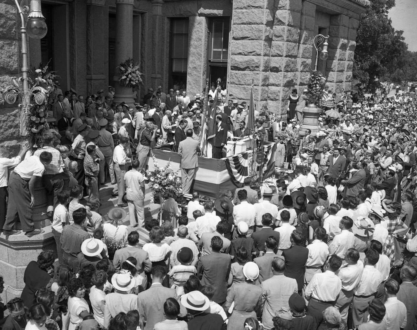 Gen. Douglas MacArthur at Podium, Crowd Watching, 1951.