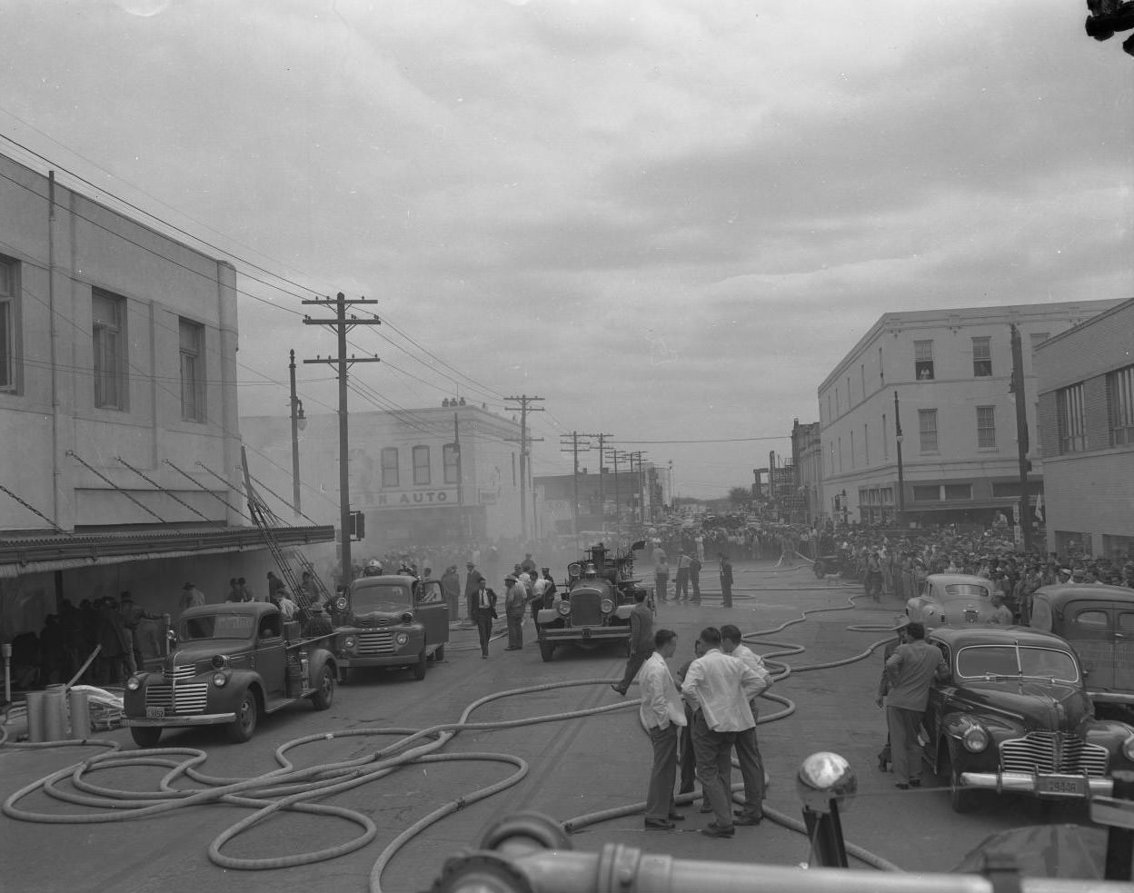 Fire Trucks in Front of Smoking T.H. Williams & Co. Building, 1950.