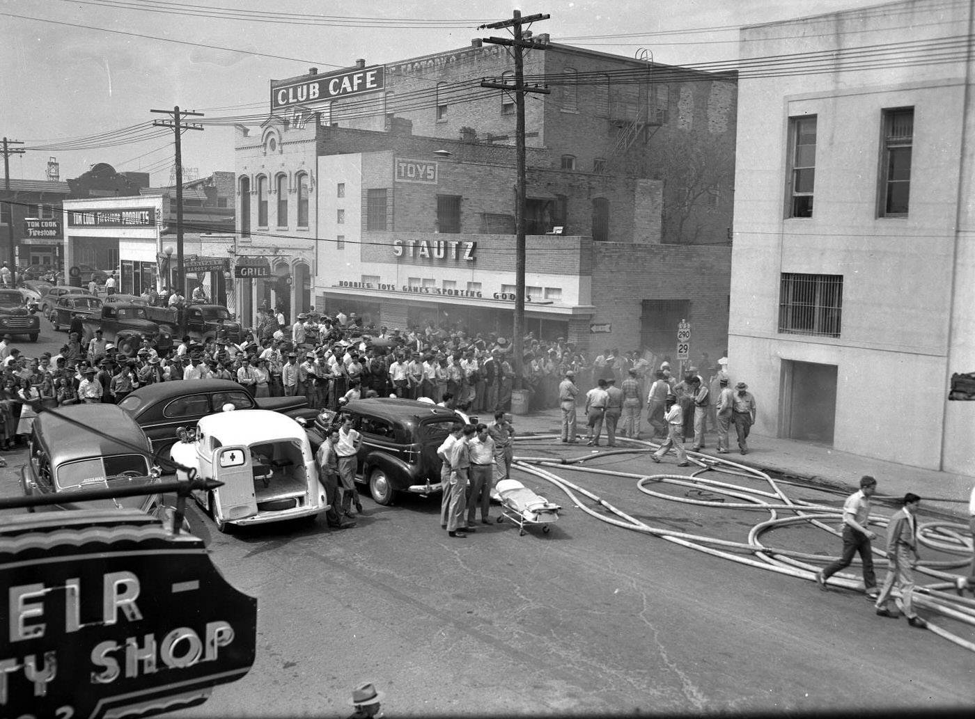 Crowd Near Burning T.H. Williams & Co. Building, 1950.