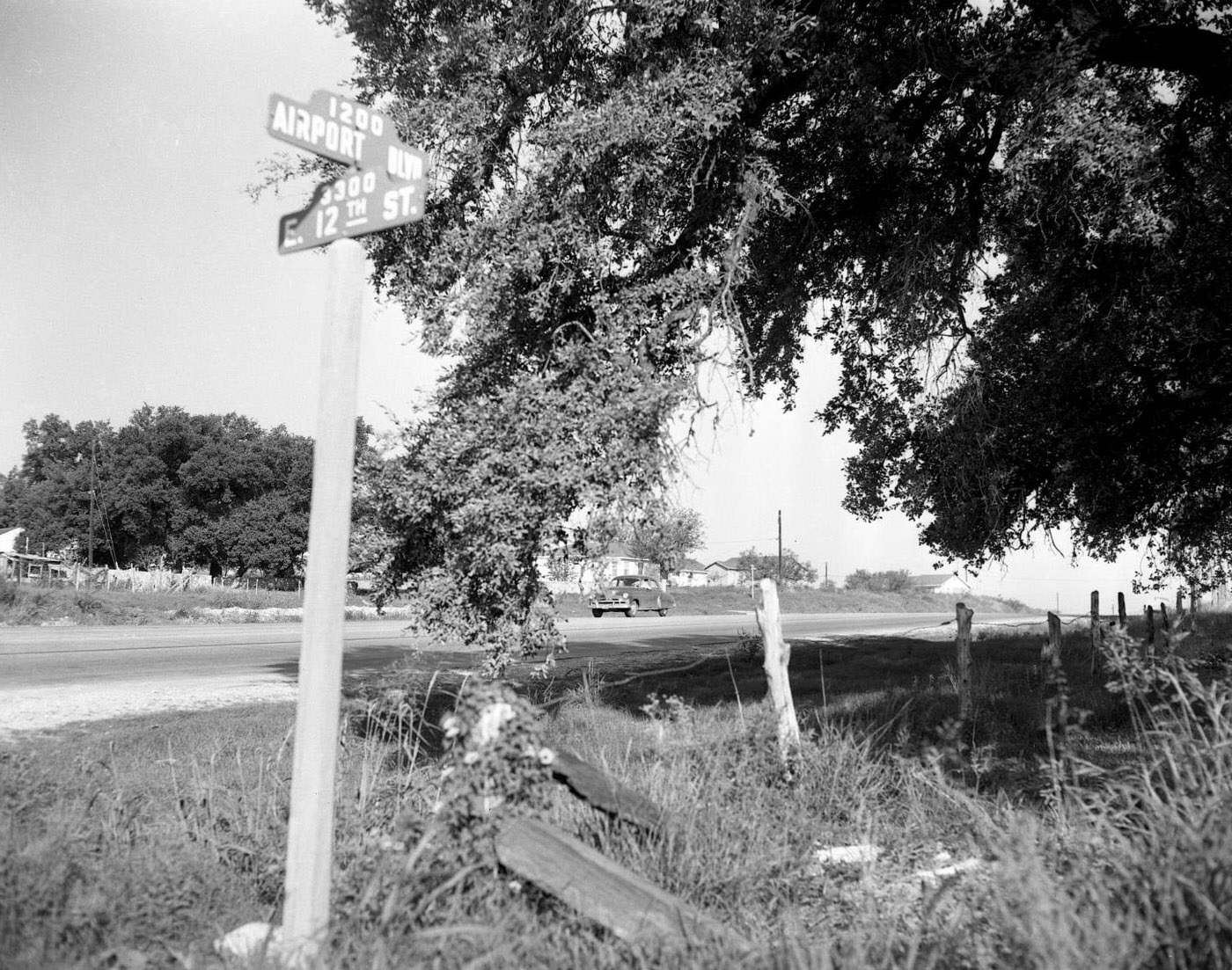 Intersection of Airport Blvd and E. 12th St from Roadside, 1951.