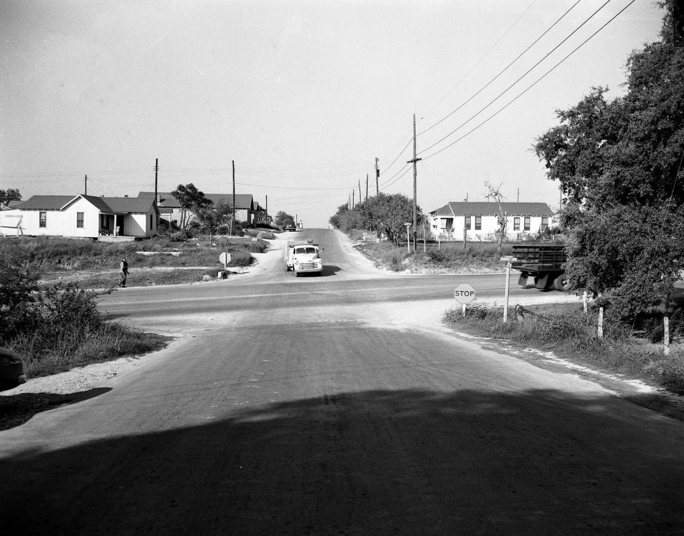 Intersection of Airport Blvd and E. 12th St, Looking West, 1951.