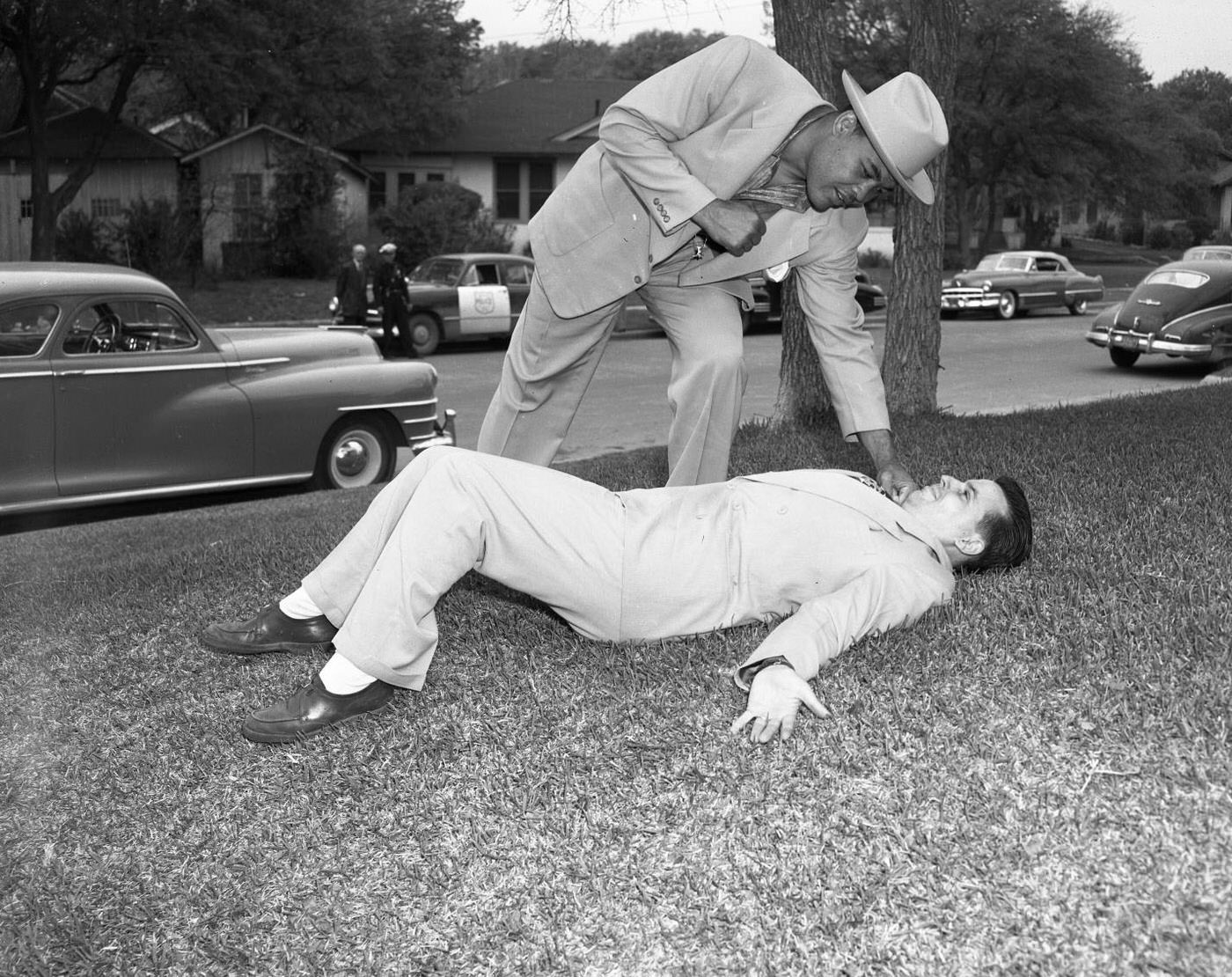 Joe Louis Standing Over Man on Ground, 1950.