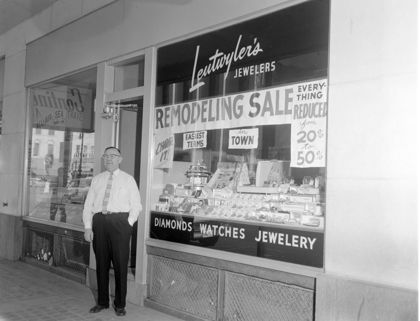 Mr. Leutwyler in Front of His Jewelry Store, 1957.