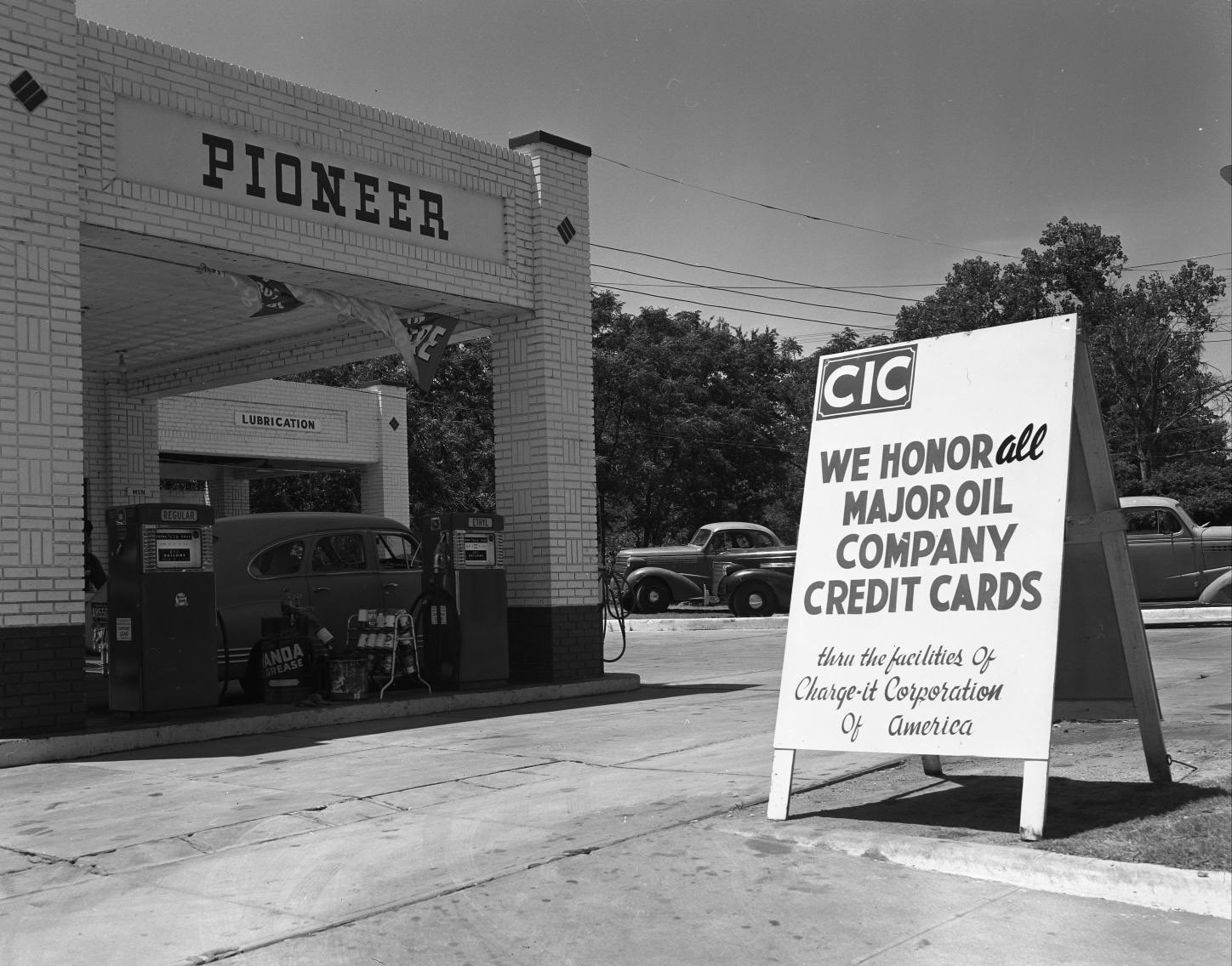 Pioneer Service Station with Car at Pump, 1956.